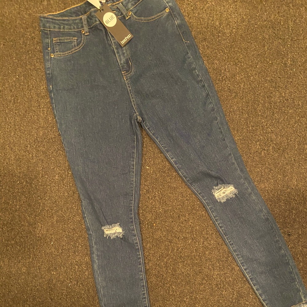 Destroyed Hem Blue Jeans